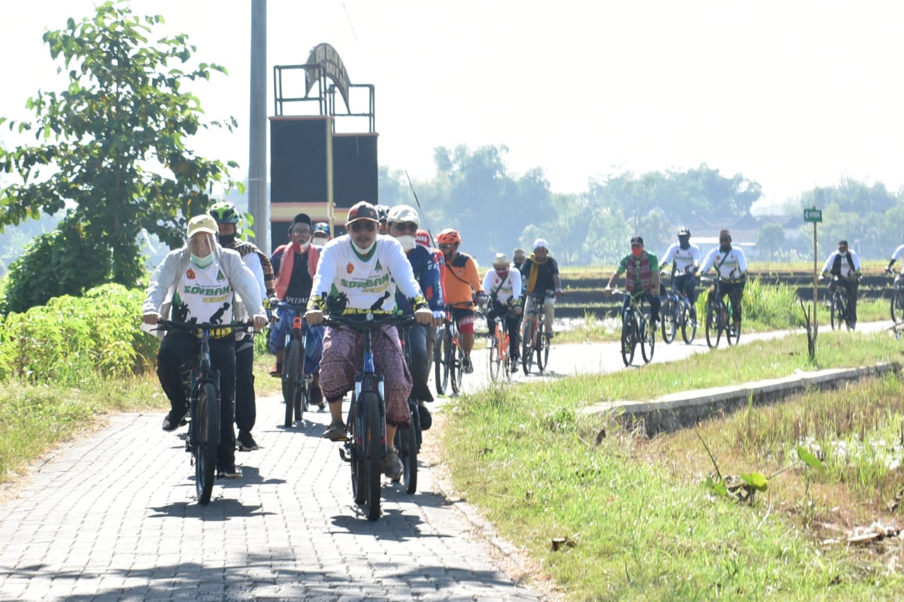 Perkuat Konsolidasi Organisasi, Ansor Kab. Pasuruan Ikuti Gowes Sorban Sehat di Winongan